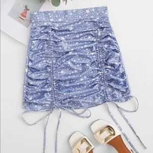 Star print drawstring mini skirt